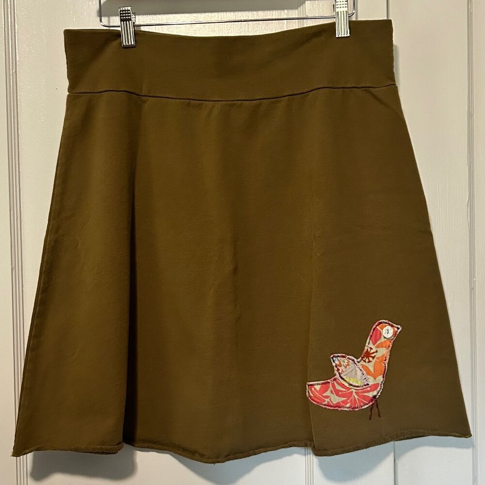 Luna by Karina Potestio tan mini skirt with bird aplique size L